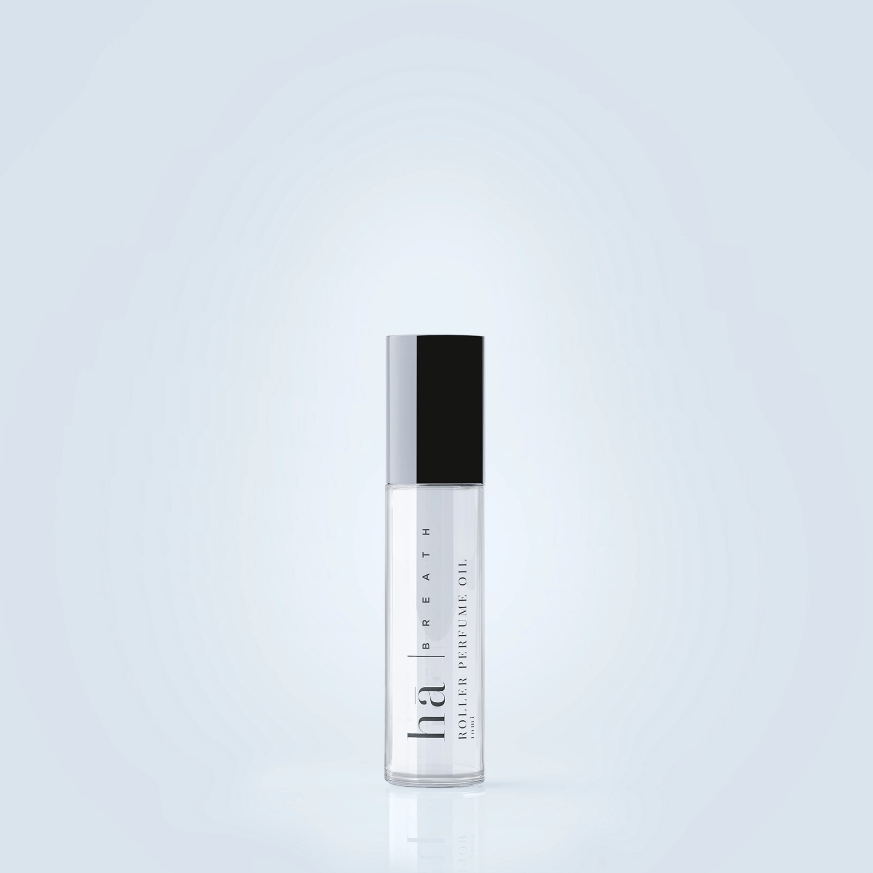 Hā Roller Perfume in front of blue background