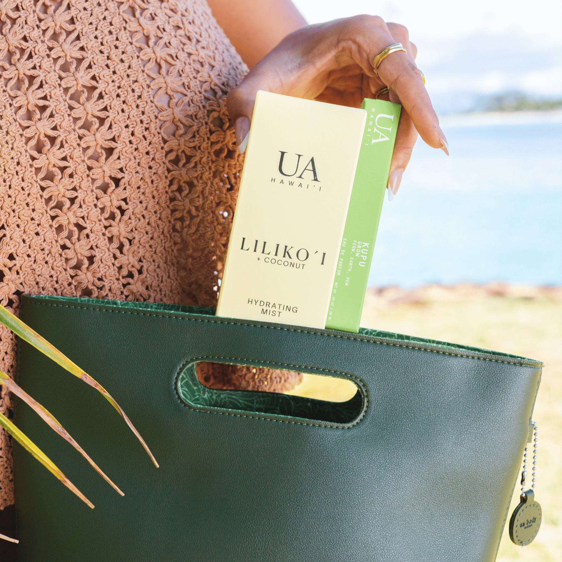 Kupu elements fragrance getting added to tote bag with Lilikoi coconut Ua Elements