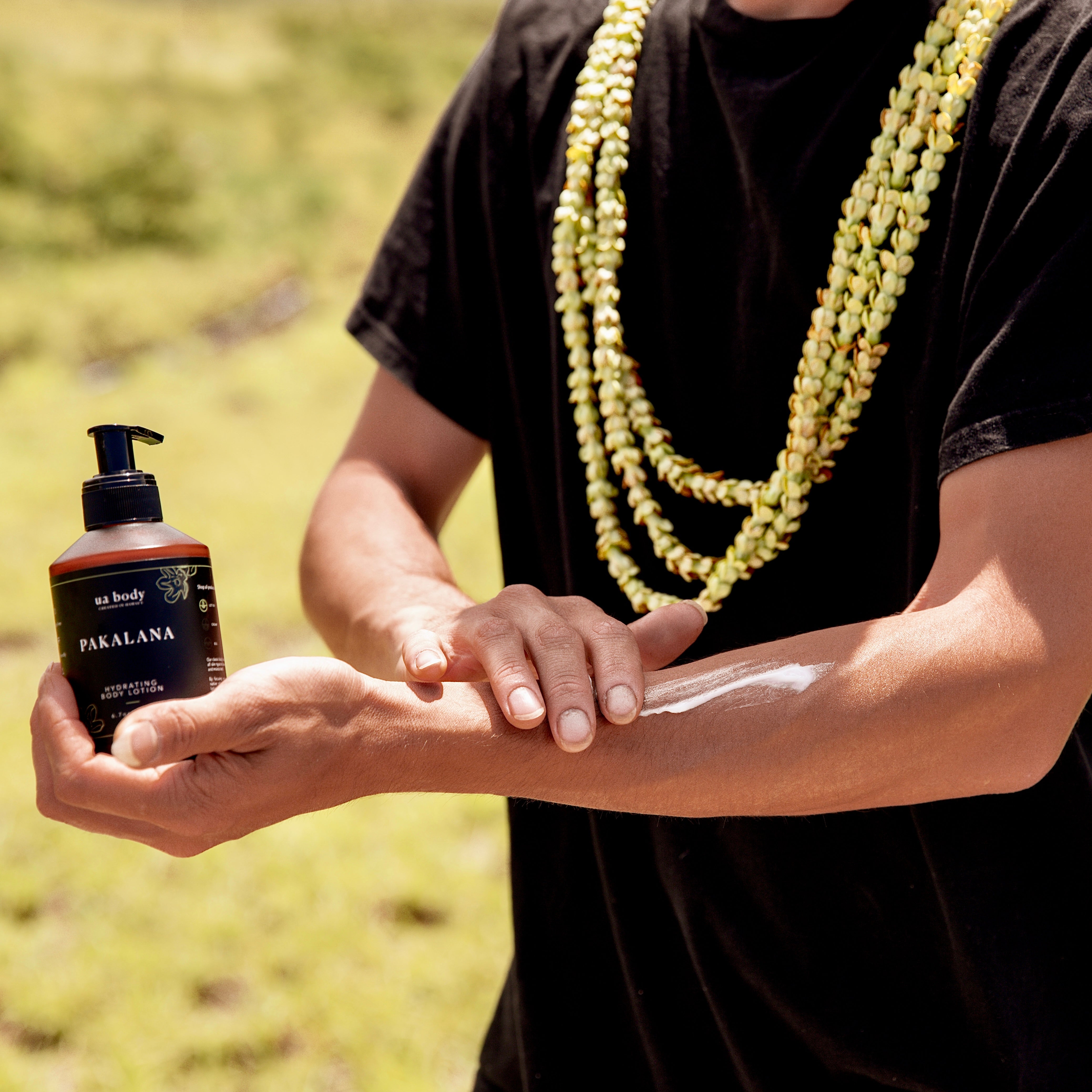 Man applying Pakalana Lotion | Hydrating Body Lotion | Hawaiian Skincare | UA Body