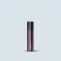 Iliahi Sandalwood Roller Perfume on blue background